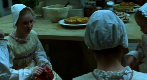 Joanna Page peeling vegetables as a servant in Miss Julie